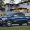 The 2022 Ram 1500 Limited 10th Anniversary Edition parked in front of a house