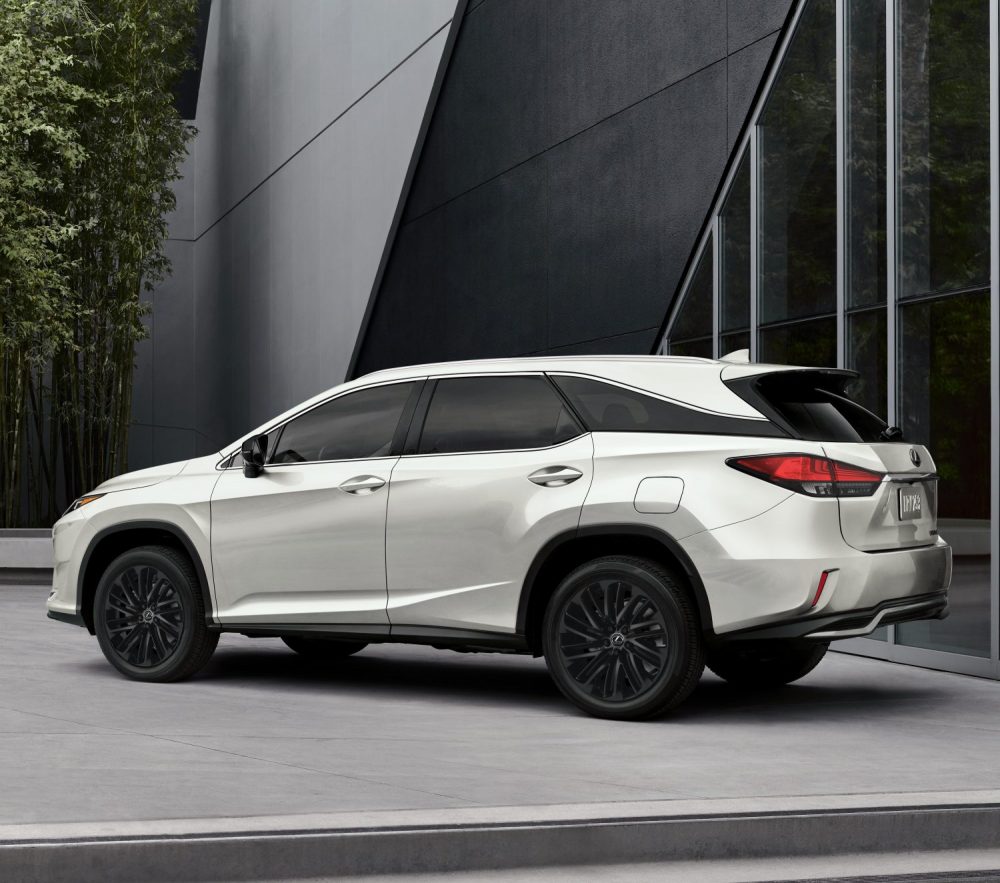 White 2022 Lexus RX L Black Line Edition parked in front of modern building