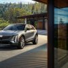 Cadillac Lyriq parked in front of a modern house