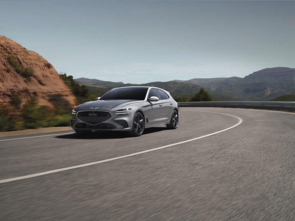 Front side view of Genesis G70 Shooting Brake driving around curve