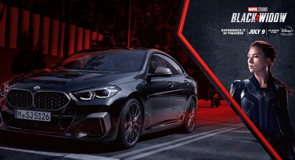 Marvel's "Black Widow" promotional photo featuring a black BMW 2 Series Gran Coupe and Scarlett Johansson as Natasha Romanoff