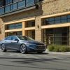 The 2019 Chevrolet Malibu Premier in front of a building