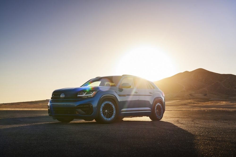 The 2021 Volkswagen Atlas Cross Sport GT concept parked at sunset in front of a mountain