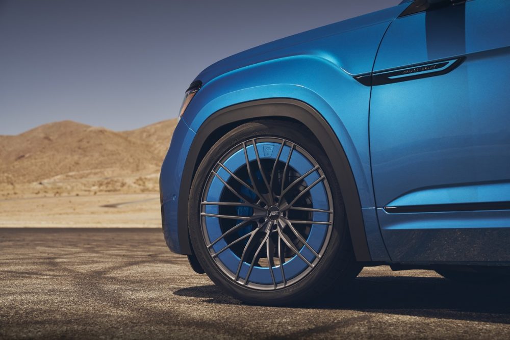 Close up of the 2021 Volkswagen Atlas Cross Sport GT concept front left wheel with Kingfisher Blue trim