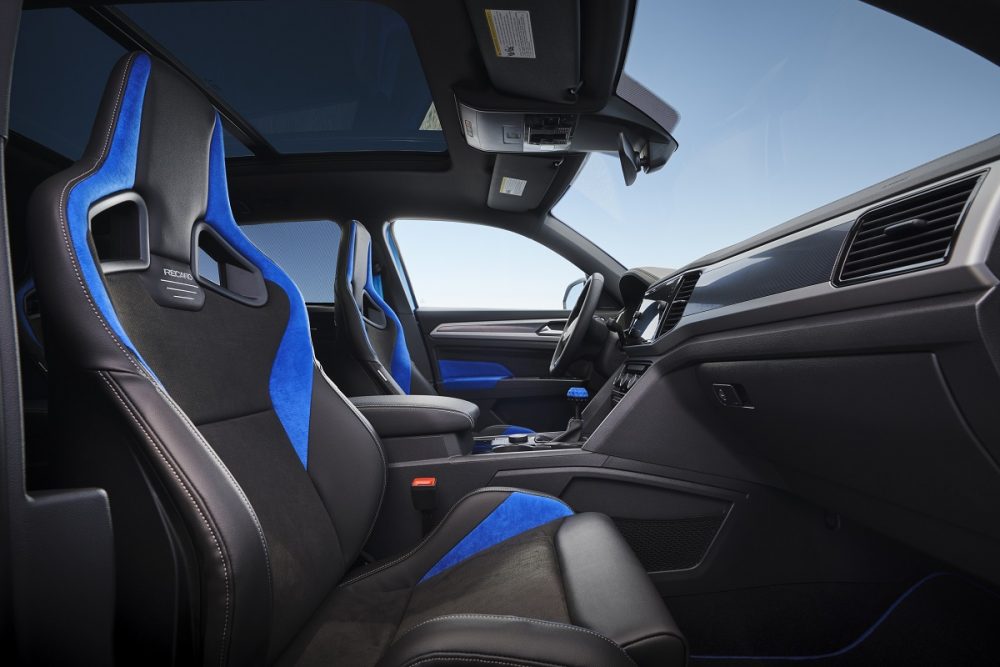 Interior photo of the front seat of the 2021 Volkswagen Atlas Cross Sport GT concept showcasing the black and Kingfisher Blue Recaro seats