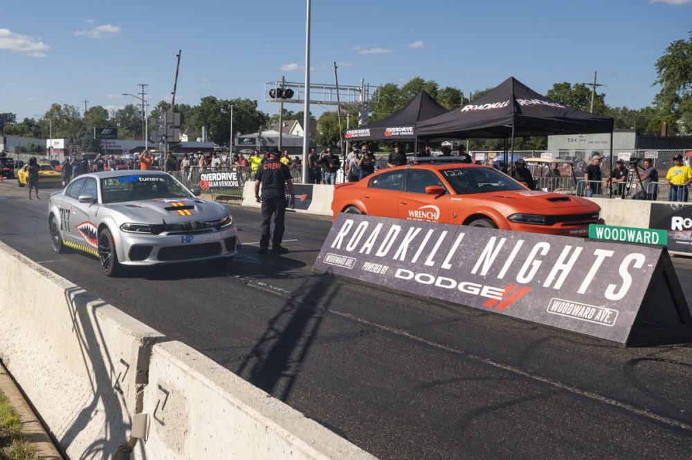 Two cars racing at the 2021 Roadkill Nights Powered by Dodge