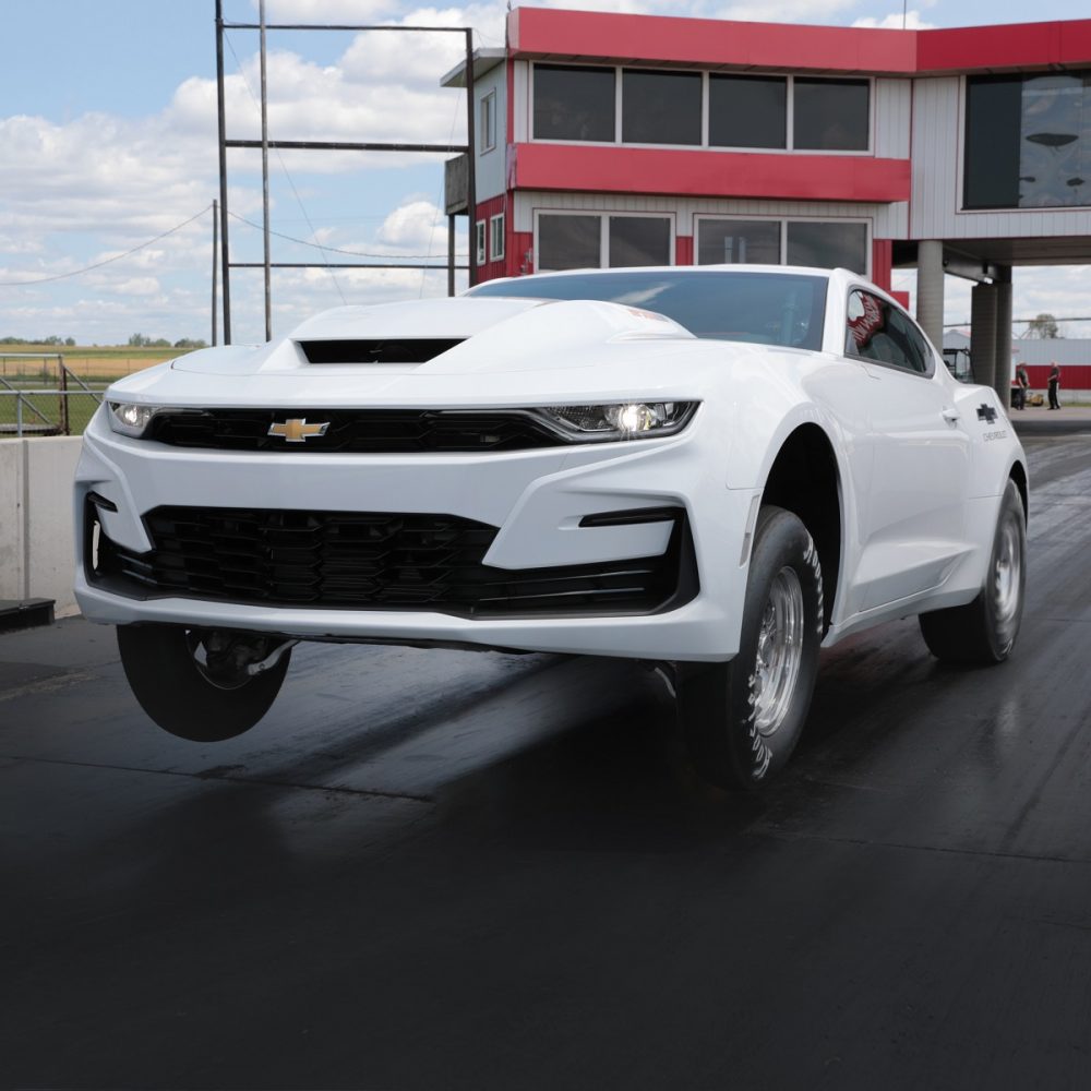 White 2022 Chevrolet COPO Camaro on a track