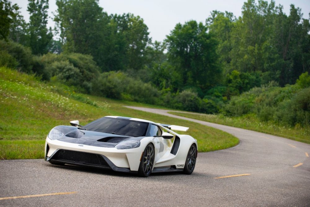 2022 Ford GT 64 Heritage Edition racing with tress in background