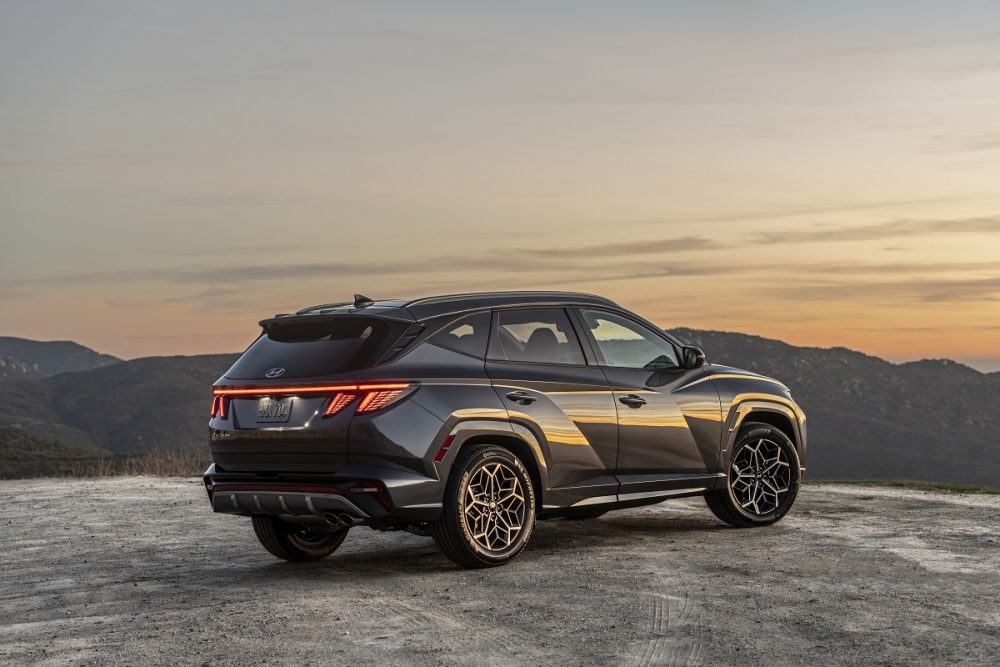 Rear side view  of 2022 Hyundai Tucson N Line parked on cliff after sunset