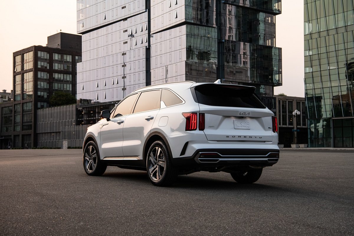 Exterior rear view of the 2022 Kia Sorento PHEV at sunset