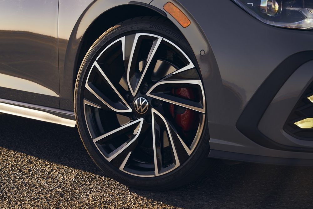 Close up of a wheel and red brake caliper on the 2022 Volkswagen Golf GTI