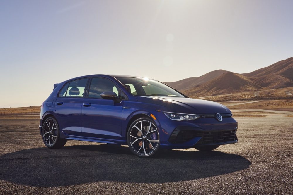 Exterior view of the 2022 Volkswagen Golf R parked in front of mountains