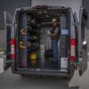 The 2022 Ram ProMaster 3500 with the backdoors open and a worker inside