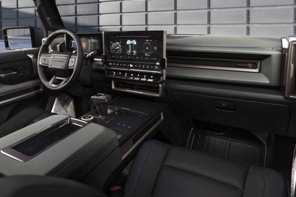 Interior view of the front seat area in the 2024 GMC Hummer EV SUV