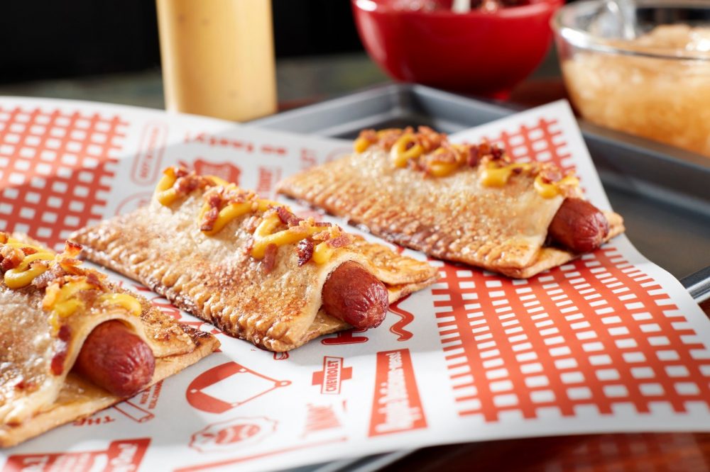 Three delicious(?) Apple Pie Hot Dogs, which will be served at the MLB Field of Dreams game on Aug. 12