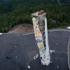 A Ford Explorer Plug-In Hybrid rests atop the OVER climbing tower in Norway, the tallest free-standing climbing structure on Earth