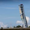 A Ford Explorer Plug-In Hybrid rests atop the OVER climbing tower in Norway, the tallest free-standing climbing structure on Earth