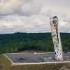 A Ford Explorer Plug-In Hybrid rests atop the OVER climbing tower in Norway, the tallest free-standing climbing structure on Earth