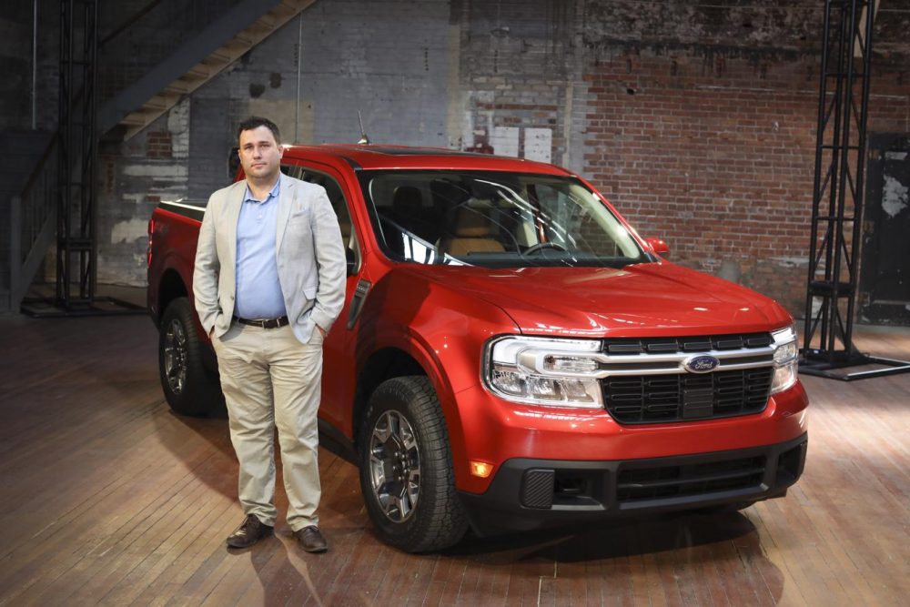 Ford Maverick materials and colors designer Rob Brancheau with a Hot Pepper Red Ford Maverick