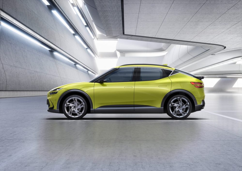 Profile view of yellow-green Genesis GV60 electric crossover