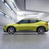 Profile view of yellow-green Genesis GV60 electric crossover