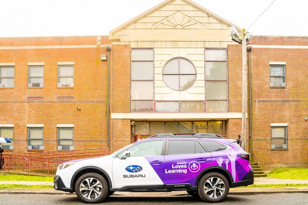 Subaru Loves Learning Outback Parked in Front of a Camden City School