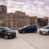 Three 2016 Chevrolet Sonic models parked in a city