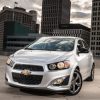 The 2016 Chevrolet Sonic RS Sedan parked in a city