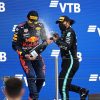 Lewis Hamilton sprays Max Verstappen with champagne on 2021 Russian Grand Prix podium