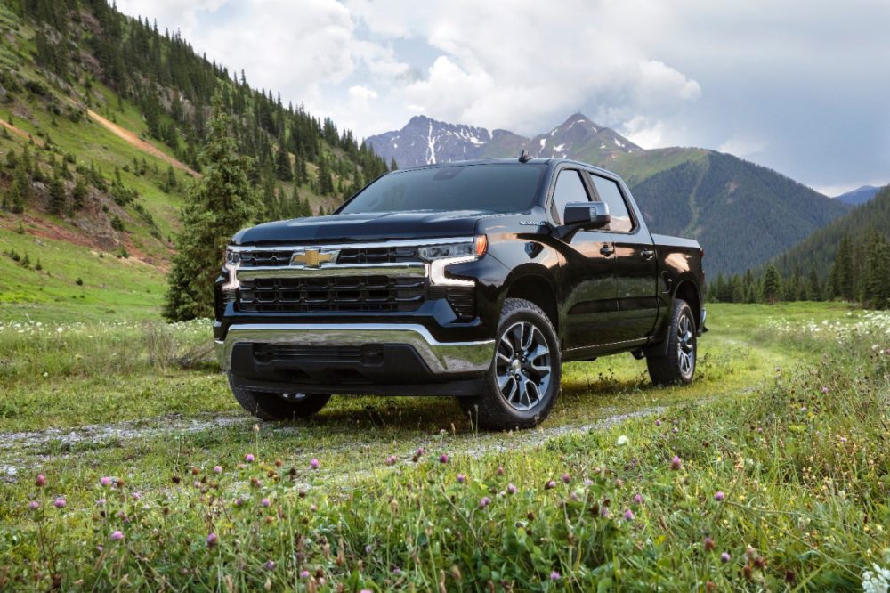 2022 Chevrolet Silverado LT Front Side View, in front of a mountain