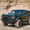 Front quarter left angle of 2022 Ford Bronco four-door in Eruption Green