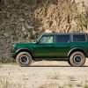 Side view of 2022 Ford Bronco four-door in Eruption Green