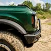 Side nose angle of 2022 Ford Bronco four-door in Eruption Green