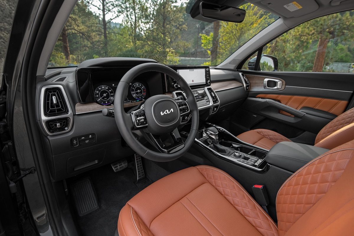 Interior view of the driver's seat and steering wheel in the 2022 Kia Sorento