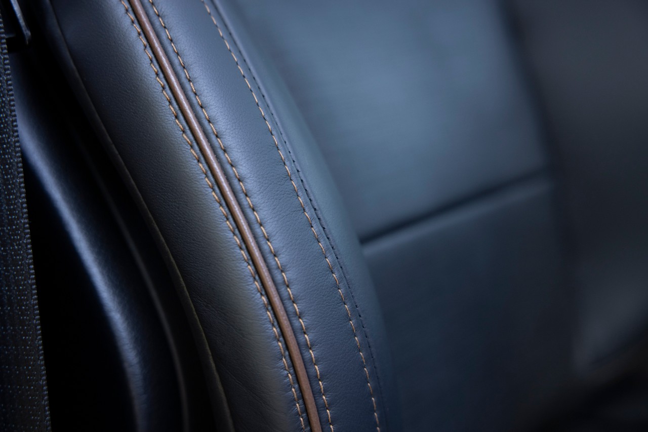 2022 Lincoln Navigator Black Label in Chroma Caviar with Invitation theme Brandy stitching closeup