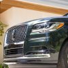 2022 Lincoln Navigator Black Label in Manhattan Green with Central Park theme grille side