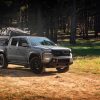 Grey 2022 Nissan Frontier with bed rack on top at Overland Expo West