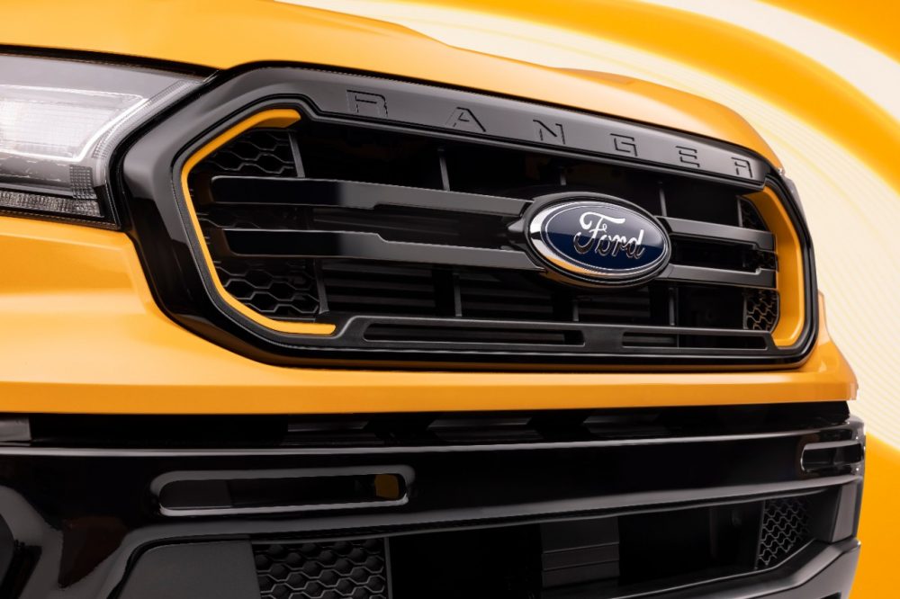 The grille of a 2022 Ranger Splash Package on a Cyber Orange Lariat CrewCab with optional FX4 Package