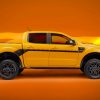 Side profile view of a 2022 Ranger Splash Package on a Cyber Orange Lariat CrewCab with optional FX4 Package