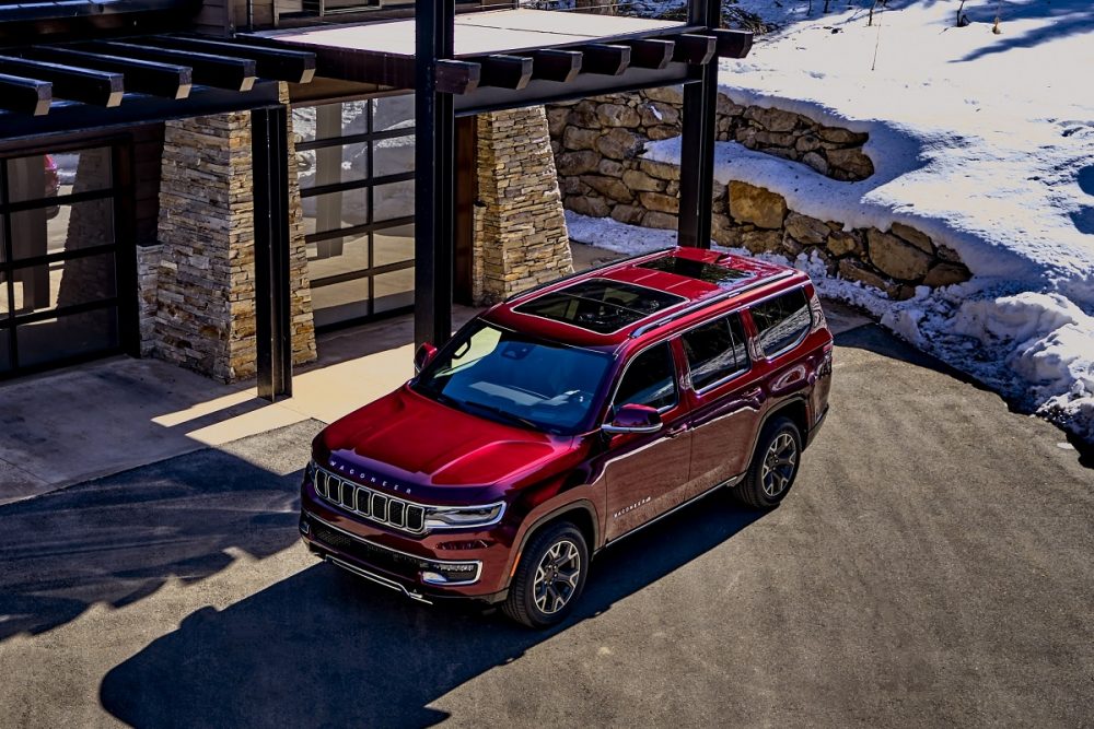 Aerial view of the 2022 Wagoneer parked at a mountain home during winter