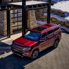 Aerial view of the 2022 Wagoneer parked at a mountain home during winter