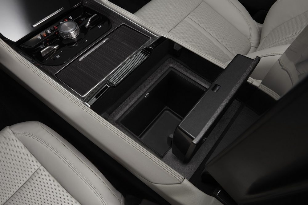 Interior view of the open center console in the 2022 Wagoneer