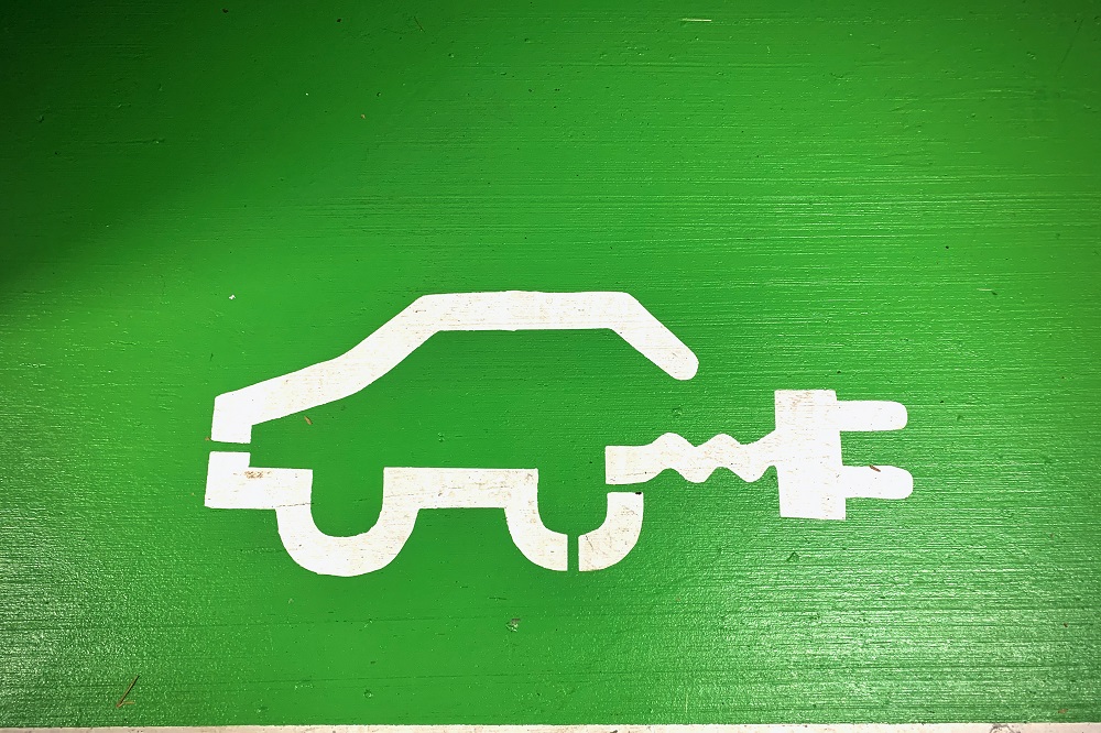 Electric car with plug (art)