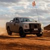 Next-generation Ford Ranger in camouflage driving through a desert