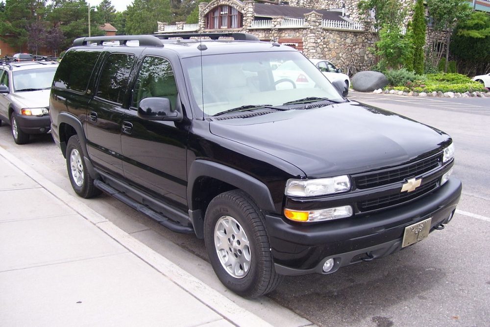 Front angled view of a black 2004 Chevrolet Suburban