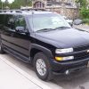 Front angled view of a black 2004 Chevrolet Suburban