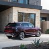 2022 Buick Envision parked in front of a stone building