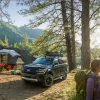 2022 Ford Expedition Timberline in a clearing with campers