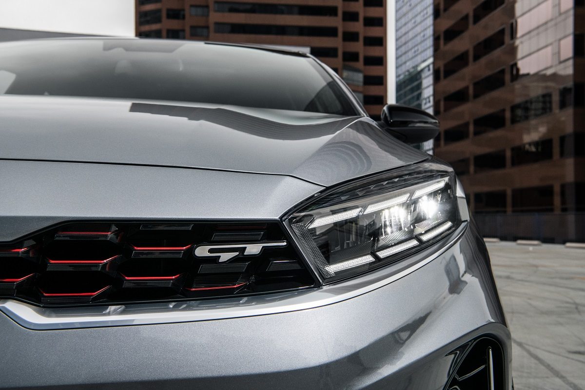 Close up of the front end of a silver 2022 Kia Forte