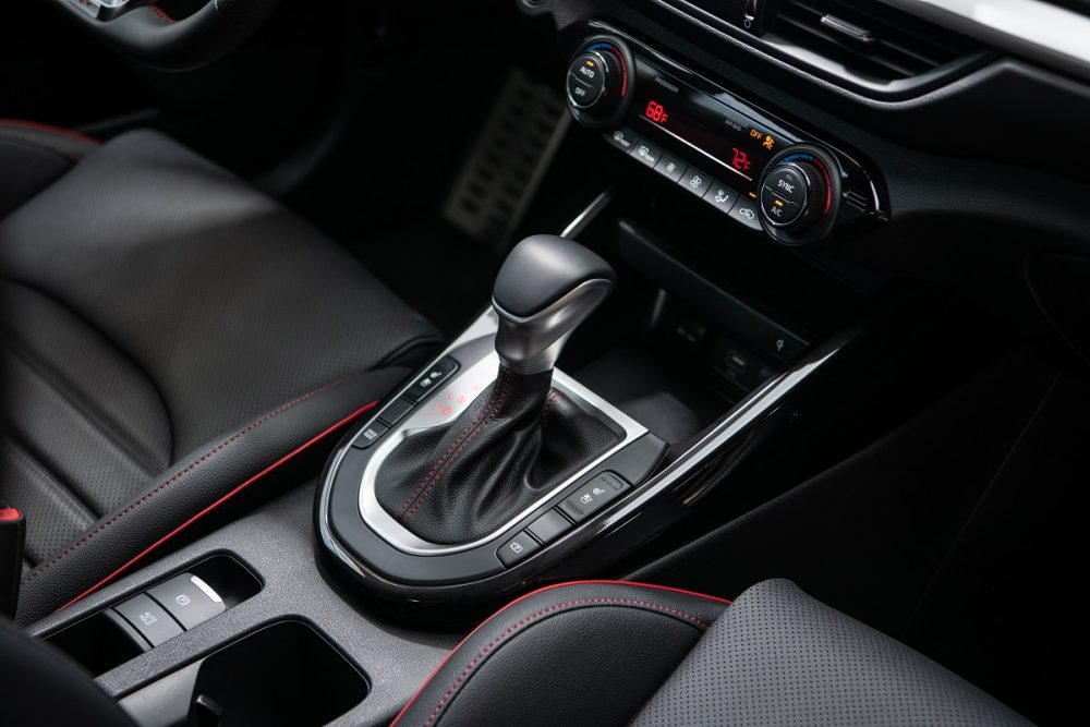 Interior view of the 2022 Kia Forte gear shift and center console